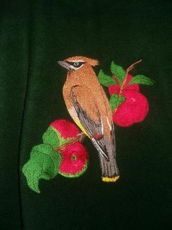 Fleecevest met pestvogel